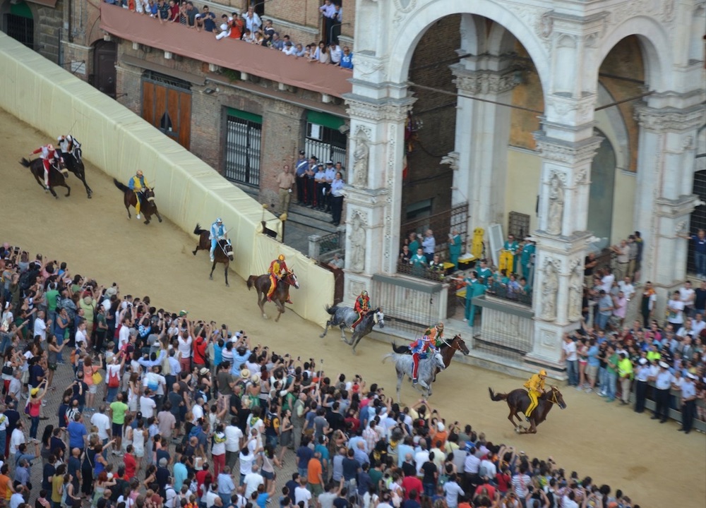 Horses racing in the Palio di Siena