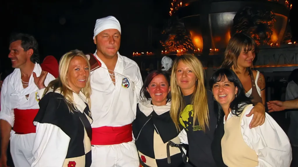 CDV small group tour guests participating in local Italian festival celebration with community members